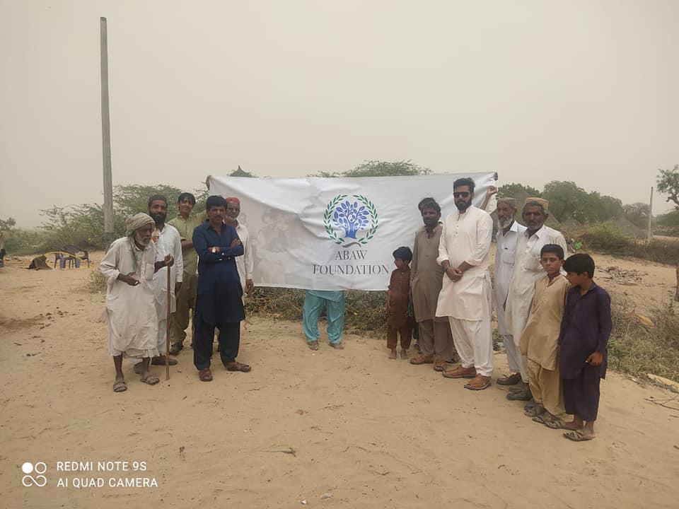 Volunteers working together at community event